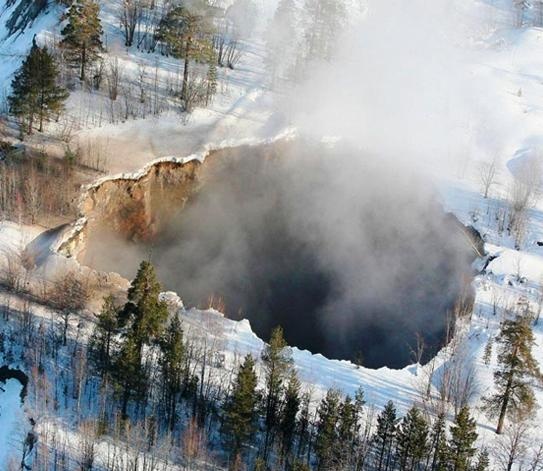 Photo:  A 200 ft wide massive Sinkhole opens up in Sweden